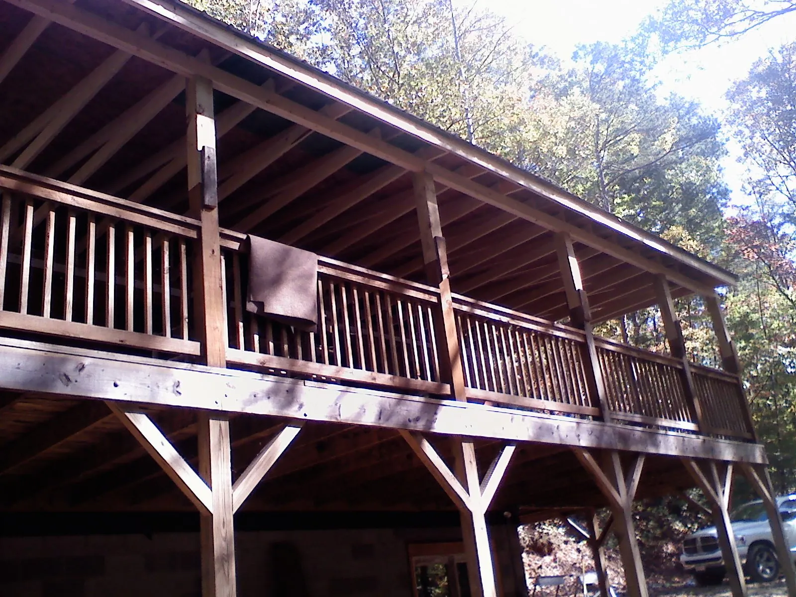 Timber framing under a new elevated porch and deck — Roof Leak Repair in Byram by Roofing Brothers